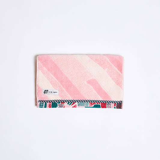 オランダのチューリップ畑をイメージしたピンク色のフェイスタオル。吸水性も高く、まるで高級ホテルのタオルの様な使用感です。